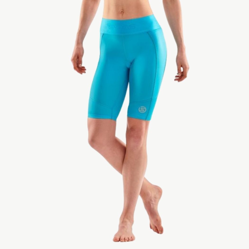 https://runners.ae/cdn/shop/products/SKINS-COMPRESSION-SERIES-3-HALF-TIGHTS-FOR-WOMEN-CYAN-ST40300023060_2.jpg?v=1656334323